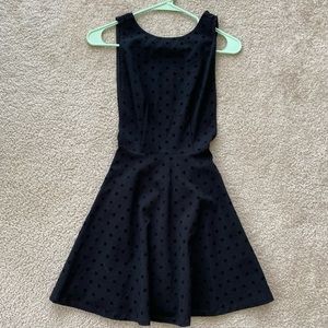 Low back little black dress.